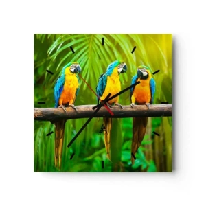 Reloj de pared - Reloj de vidrio - Tres loros coloridos sobre un fondo de vegetación tropical. - 30x30cm - ¿Y has oído que ella...? - Decoración de pared moderna para salón y dormitorio ARTTOR
