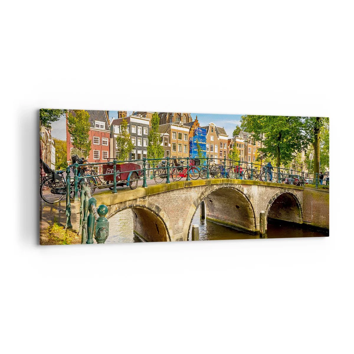 Cuadro sobre lienzo - Impresión de Imagen - Un pintoresco canal con un puente en Ámsterdam. - 120x50cm - Primavera en el canal - Decoración de pared moderna para salón y dormitorio ARTTOR