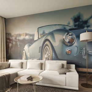 Fotomural Standard Eco - Un coche deportivo clásico frente a un paisaje montañoso. - 100x70cm - Porque el estilo importa - Decoración de pared moderna para salón y dormitorio ARTTOR