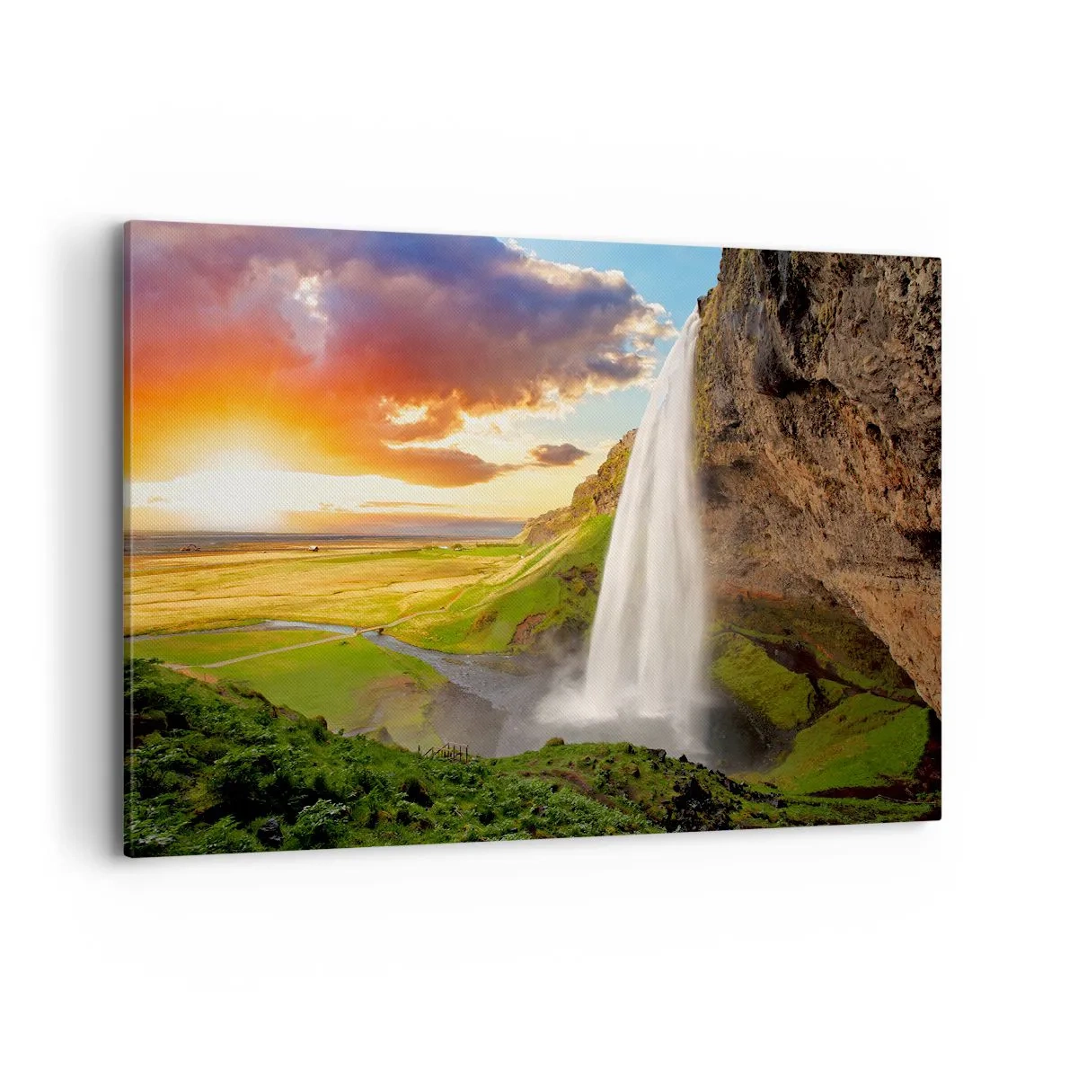 Cuadro sobre lienzo - Impresión de Imagen - Una cascada en un paisaje pintoresco al atardecer. - 100x70cm - La plenitud del verano islandés - Decoración de pared moderna para salón y dormitorio ARTTOR