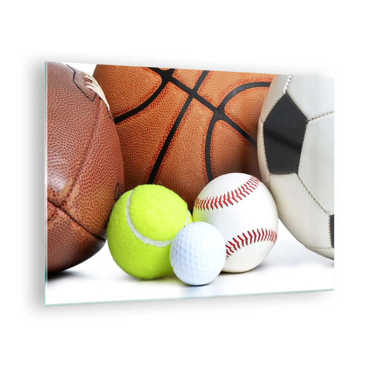 Cuadro sobre vidrio - Impresiones sobre Vidrio - Un conjunto de pelotas deportivas sobre un fondo blanco. - 70x50cm - Unidos por el deporte - Decoración de pared moderna para salón y dormitorio ARTTOR