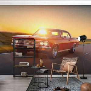 Fotomural Premium Canvas - Un coche rojo al atardecer en una carretera abierta. - 100x70cm - El deseo es rojo - Decoración de pared moderna para salón y dormitorio ARTTOR