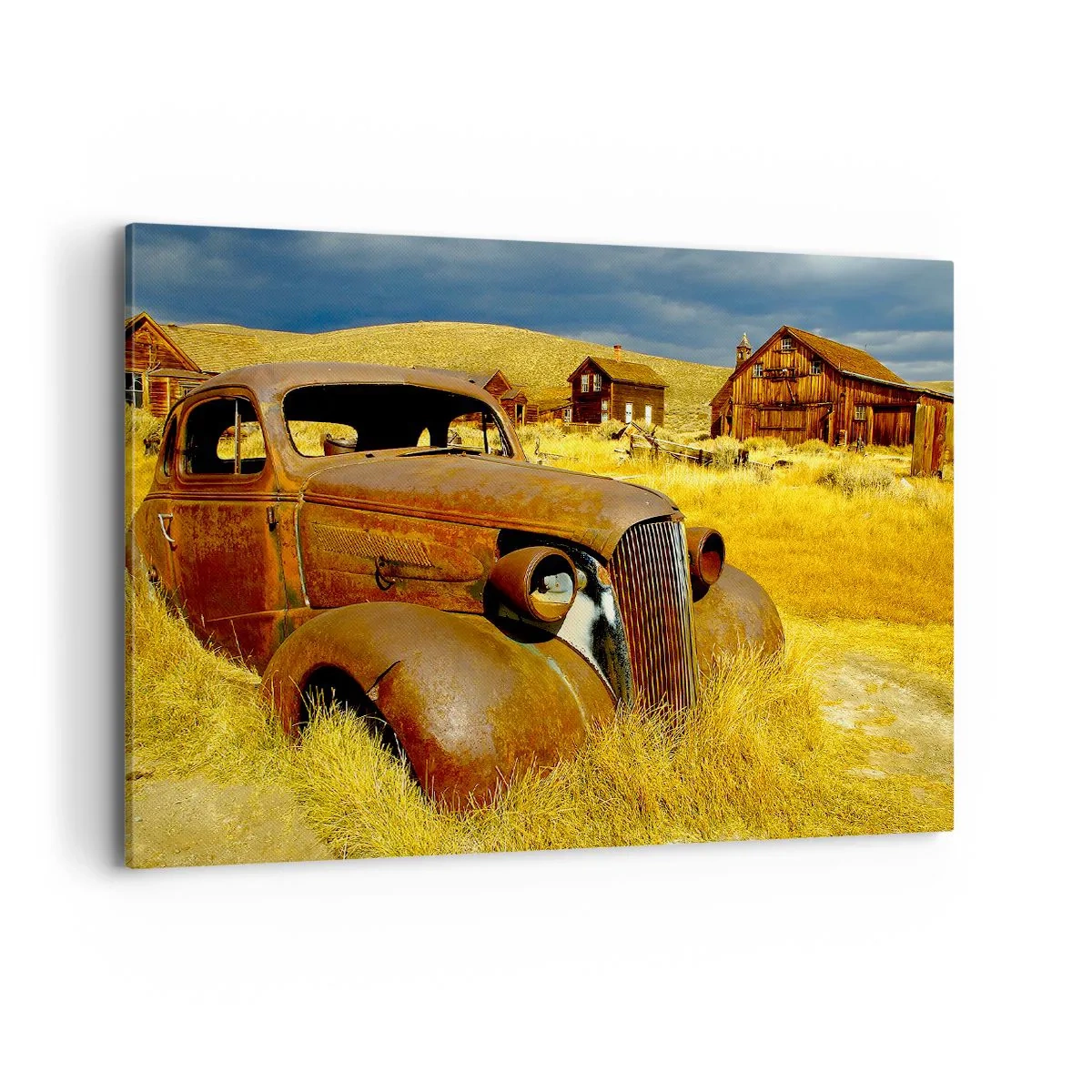 Cuadro sobre lienzo - Impresión de Imagen - Un viejo coche oxidado con el telón de fondo de cabañas de madera abandonadas. - 100x70cm - Un merecido descanso - Decoración de pared moderna para salón y dormitorio ARTTOR