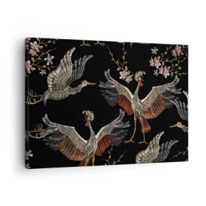 Cuadro sobre lienzo - Impresión de Imagen - Grullas y flores elegantes sobre un fondo negro. - 70x50cm - Aves de cuento de hadas - Decoración de pared moderna para salón y dormitorio ARTTOR
