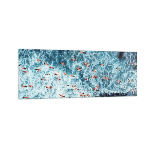 Cuadro sobre vidrio - Impresiones sobre Vidrio - Una vista aérea de flamencos rosados sobre un océano azul. - 140x50cm - Un desfile marítimo - Decoración de pared moderna para salón y dormitorio ARTTOR