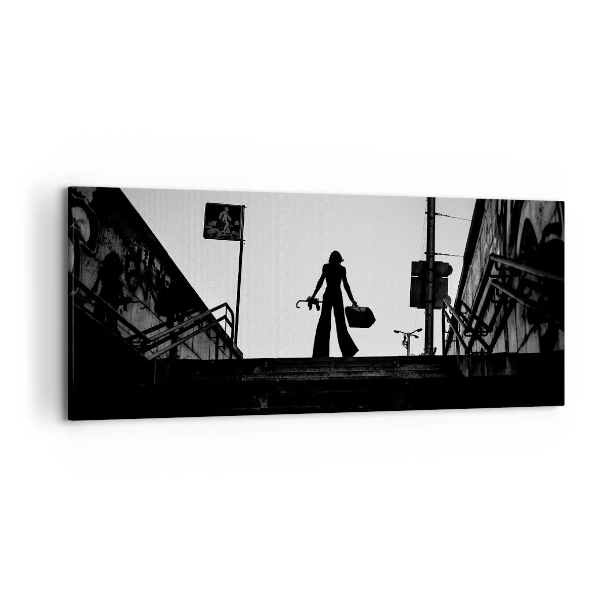 Cuadro sobre lienzo - Impresión de Imagen - Una figura de mujer en las escaleras en blanco y negro con una atmósfera dinámica. - 120x50cm - Paseo urbano - Decoración de pared moderna para salón y dormitorio ARTTOR
