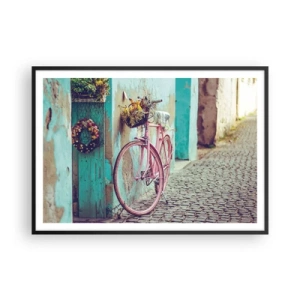 Póster en marco negro - Una bicicleta rosa junto a una puerta turquesa. - 100x70cm - Ahora mismo vuelvo - Decoración de pared moderna para salón y dormitorio ARTTOR