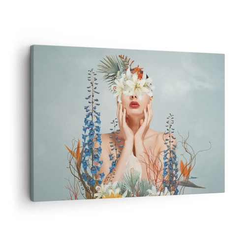 Cuadro sobre lienzo - Impresión de Imagen - Retrato de una mujer con un motivo floral sobre un fondo azul. - 70x50cm - Mujer-flor - Decoración de pared moderna para salón y dormitorio ARTTOR