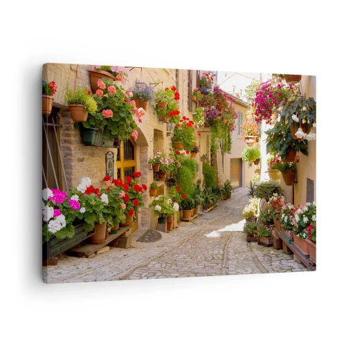 Cuadro sobre lienzo - Impresión de Imagen - Una calle con flores en macetas y muros de piedra. - 70x50cm - En un torrente de flores - Decoración de pared moderna para salón y dormitorio ARTTOR