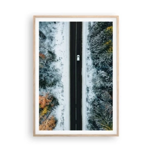 Póster en marco roble claro - Atravesar el bosque en invierno - 70x100 cm
