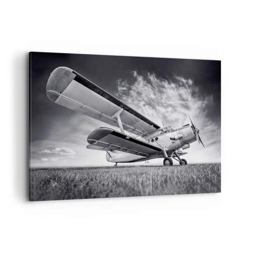 Cuadro sobre lienzo - Impresión de Imagen - Un avión contra un cielo dramático en blanco y negro. - 100x70cm - El vagamundo alado - Decoración de pared moderna para salón y dormitorio ARTTOR