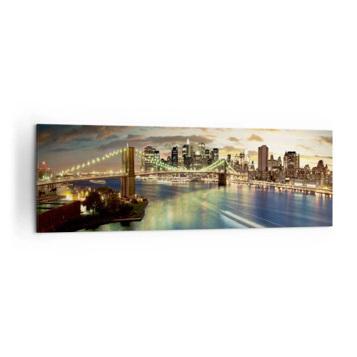 Cuadro sobre lienzo - Impresión de Imagen - Un puente iluminado con la ciudad al fondo, con luces reflejadas en el agua. - 160x50cm - Un atardecer iluminado sobre Manhattan - Decoración de pared moderna para salón y dormitorio ARTTOR
