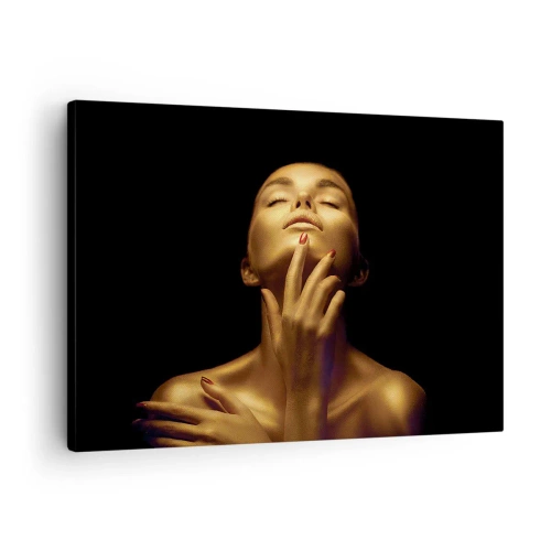 Cuadro sobre lienzo - Impresión de Imagen - Retrato de una mujer con un brillo dorado sobre un fondo negro. - 70x50cm - Como seda dorada - Decoración de pared moderna para salón y dormitorio ARTTOR