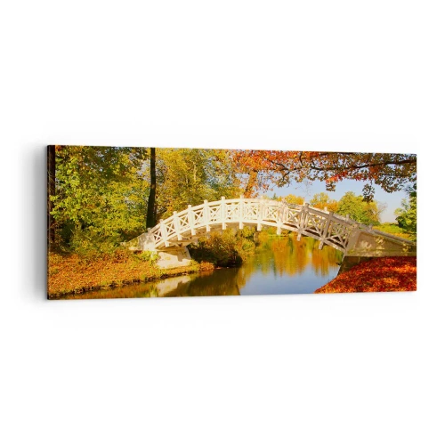 Cuadro sobre lienzo - Impresión de Imagen - Un puente en un parque rodeado de hojas otoñales sobre aguas tranquilas. - 140x50cm - En un puente blanco de suspiros - Decoración de pared moderna para salón y dormitorio ARTTOR