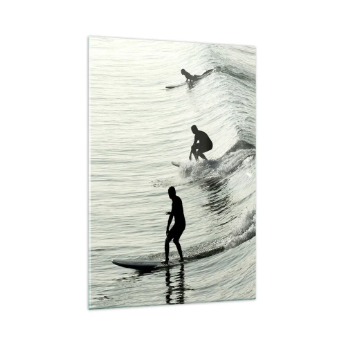 Cuadro sobre vidrio - Impresiones sobre Vidrio - Surfistas en las olas en una toma monocromática - 70x100cm - Al encuentro de la ola - Decoración de pared moderna para salón y dormitorio ARTTOR