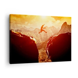 Cuadro sobre lienzo - Impresión de Imagen - Una figura saltando entre rocas con montañas al fondo. - 70x50cm - Pasando el límite - Decoración de pared moderna para salón y dormitorio ARTTOR