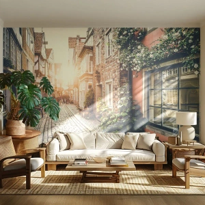 Fotomural Standard Eco - Una calle histórica bajo el resplandor del sol poniente. - 100x70cm - El callejón de las rosas - Decoración de pared moderna para salón y dormitorio ARTTOR