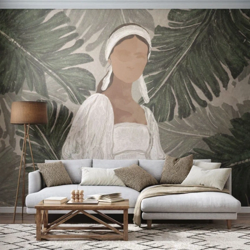 Fotomural Premium Sand - La figura de una mujer con un vestido blanco sobre un fondo de hojas exóticas. - 100x70cm - Retrato exótico - Decoración de pared moderna para salón y dormitorio ARTTOR