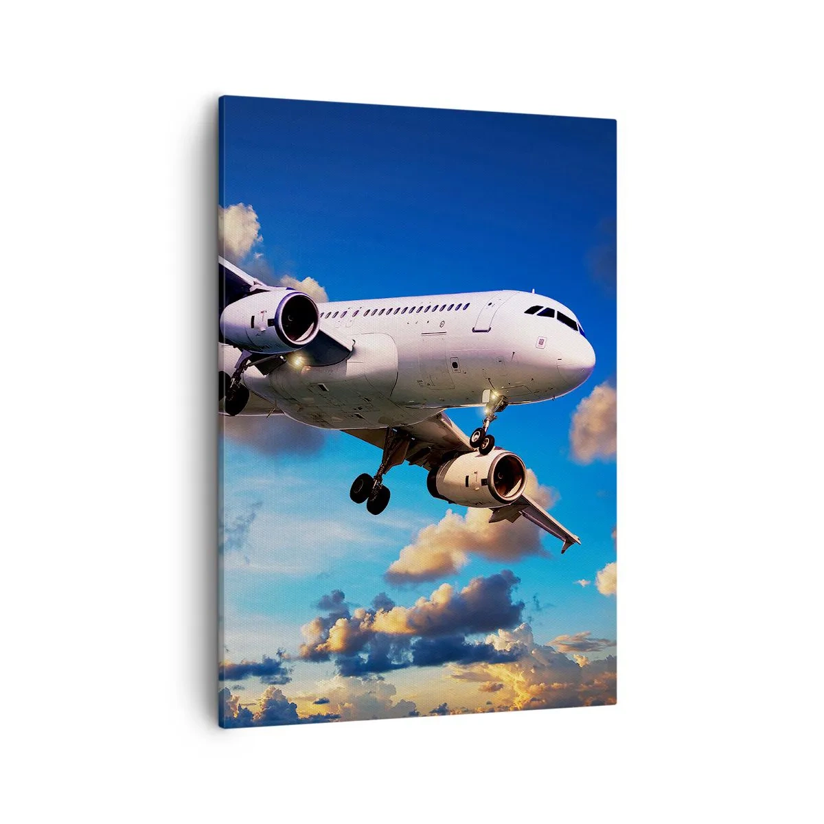 Cuadro sobre lienzo - Impresión de Imagen - Un avión de pasajeros contra las nubes al atardecer. - 50x70cm - Un viaje en blanco y azul - Decoración de pared moderna para salón y dormitorio ARTTOR