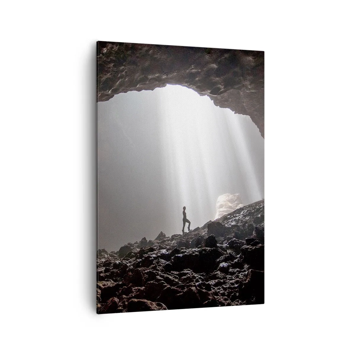 Cuadro sobre lienzo - Impresión de Imagen - Una figura en una cueva iluminada por rayos de luz. - 70x100cm - Gruta luminosa - Decoración de pared moderna para salón y dormitorio ARTTOR