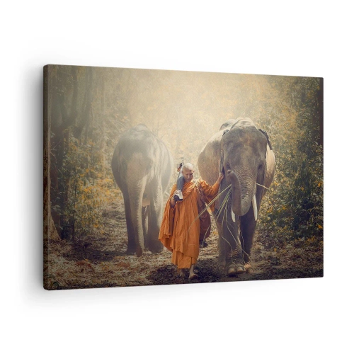 Cuadro sobre lienzo - Impresión de Imagen - Un monje con una túnica naranja guía un elefante en el bosque. - 70x50cm - Comprensión total - Decoración de pared moderna para salón y dormitorio ARTTOR