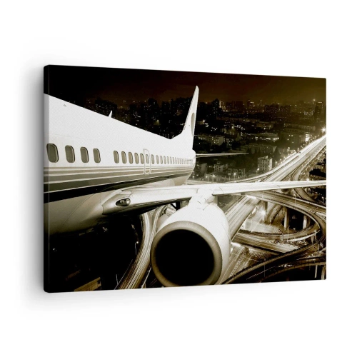 Cuadro sobre lienzo - Impresión de Imagen - Un avión sobre una ciudad nocturna con carreteras iluminadas. - 70x50cm - Vuela hacia la noche - Decoración de pared moderna para salón y dormitorio ARTTOR