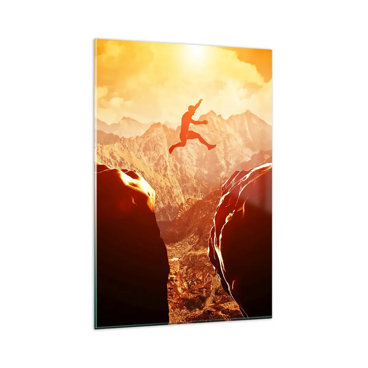 Cuadro sobre vidrio - Impresiones sobre Vidrio - Una figura saltando entre rocas con montañas al fondo. - 80x120cm - Pasando el límite - Decoración de pared moderna para salón y dormitorio ARTTOR