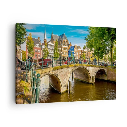 Cuadro sobre lienzo - Impresión de Imagen - Un pintoresco canal con un puente en Ámsterdam. - 70x50cm - Primavera en el canal - Decoración de pared moderna para salón y dormitorio ARTTOR