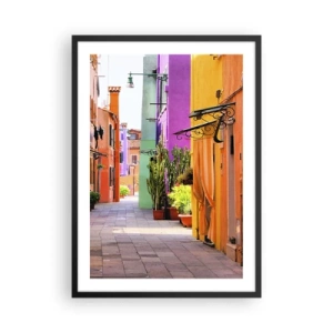 Póster en marco negro - Una calle colorida con plantas y fachadas de edificios vibrantes. - 50x70cm - El callejón arco iris - Decoración de pared moderna para salón y dormitorio ARTTOR