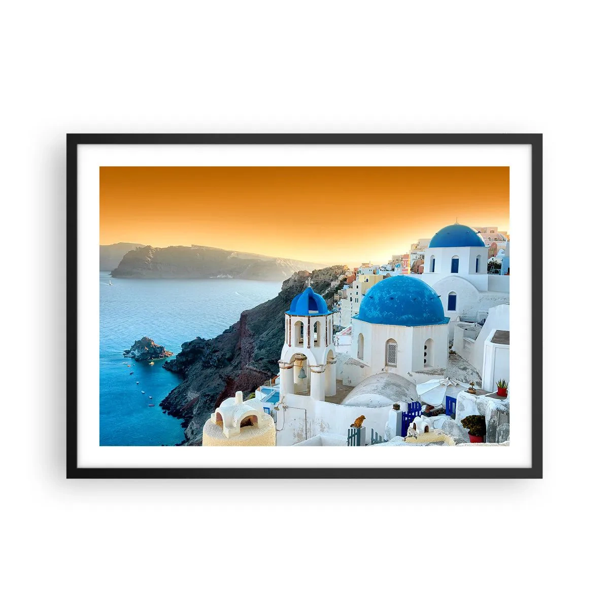 Póster en marco negro - Vista de Santorini con edificios blancos y mar azul. - 70x50cm - Santorini - el abrazo a las rocas - Decoración de pared moderna para salón y dormitorio ARTTOR