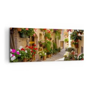Cuadro sobre lienzo - Impresión de Imagen - Una calle con flores en macetas y muros de piedra. - 120x50cm - En un torrente de flores - Decoración de pared moderna para salón y dormitorio ARTTOR