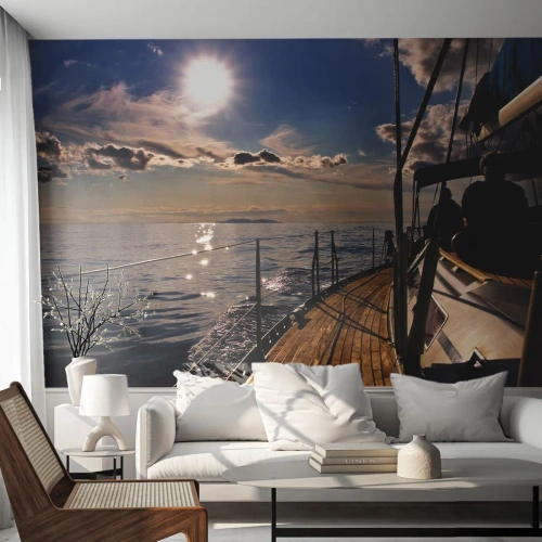 Fotomural Premium Sand - Un velero en un mar tranquilo al atardecer. - 100x70cm - Bajo las velas hacia el sol - Decoración de pared moderna para salón y dormitorio ARTTOR