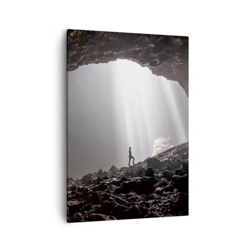 Cuadro sobre lienzo - Impresión de Imagen - Una figura en una cueva iluminada por rayos de luz. - 50x70cm - Gruta luminosa - Decoración de pared moderna para salón y dormitorio ARTTOR