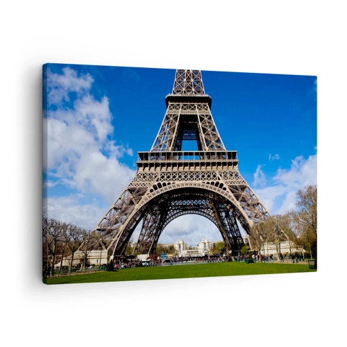 Cuadro sobre lienzo - Impresión de Imagen - La Torre Eiffel con el cielo azul y un parque verde como fondo. - 70x50cm - Todo París a sus pies - Decoración de pared moderna para salón y dormitorio ARTTOR