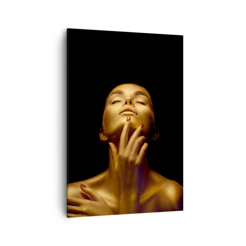 Cuadro sobre lienzo - Impresión de Imagen - Retrato de una mujer con un brillo dorado sobre un fondo negro. - 70x100cm - Como seda dorada - Decoración de pared moderna para salón y dormitorio ARTTOR