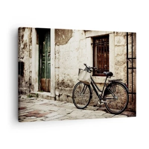 Cuadro sobre lienzo - Impresión de Imagen - Una bicicleta contra una pared de piedra con una ventana y puerta de estilo retro. - 70x50cm - Regreso al pasado - Decoración de pared moderna para salón y dormitorio ARTTOR