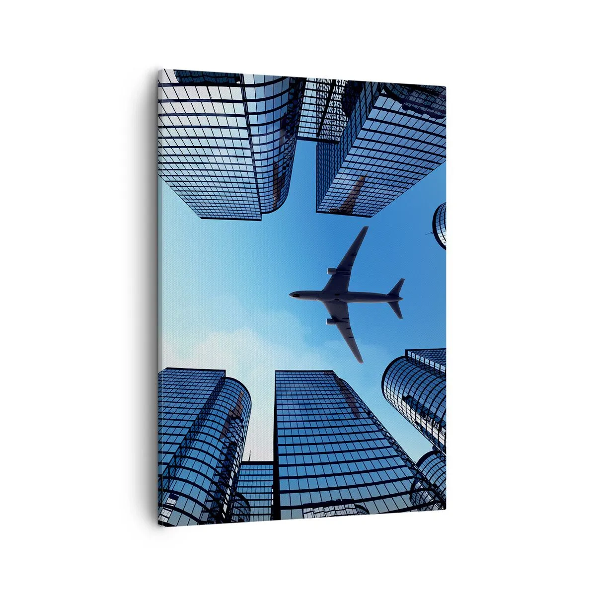 Cuadro sobre lienzo - Impresión de Imagen - Un avión volando sobre modernos rascacielos en el centro de la ciudad. - 50x70cm - La vista desde el abismo de cristal - Decoración de pared moderna para salón y dormitorio ARTTOR