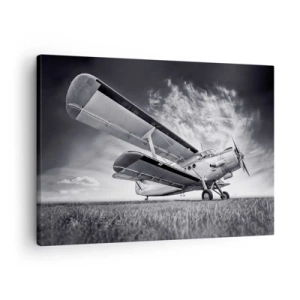 Cuadro sobre lienzo - Impresión de Imagen - Un avión contra un cielo dramático en blanco y negro. - 70x50cm - El vagamundo alado - Decoración de pared moderna para salón y dormitorio ARTTOR