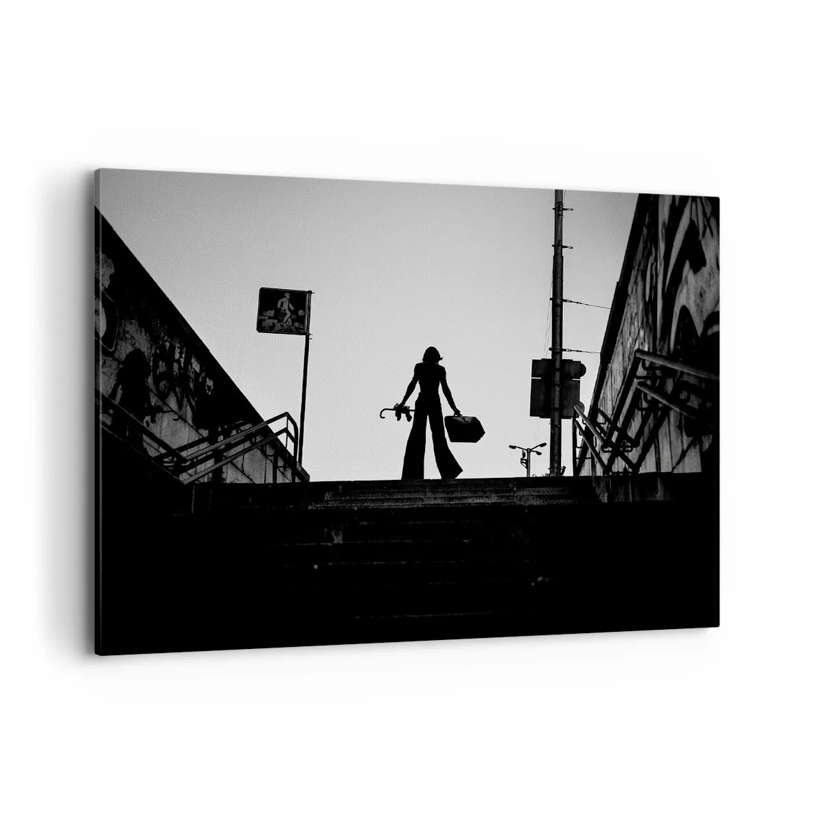 Cuadro sobre lienzo - Impresión de Imagen - Una figura de mujer en las escaleras en blanco y negro con una atmósfera dinámica. - 100x70cm - Paseo urbano - Decoración de pared moderna para salón y dormitorio ARTTOR