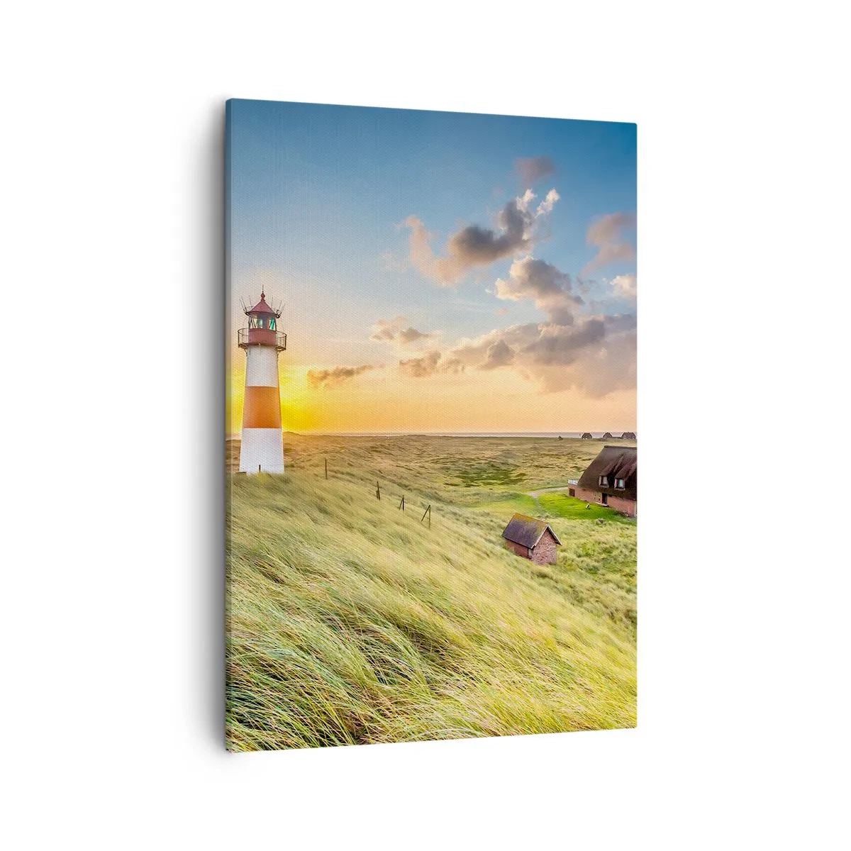 Cuadro sobre lienzo - Impresión de Imagen - Un faro con prados y casas al sol al fondo. - 50x70cm - Entre las olas - Decoración de pared moderna para salón y dormitorio ARTTOR