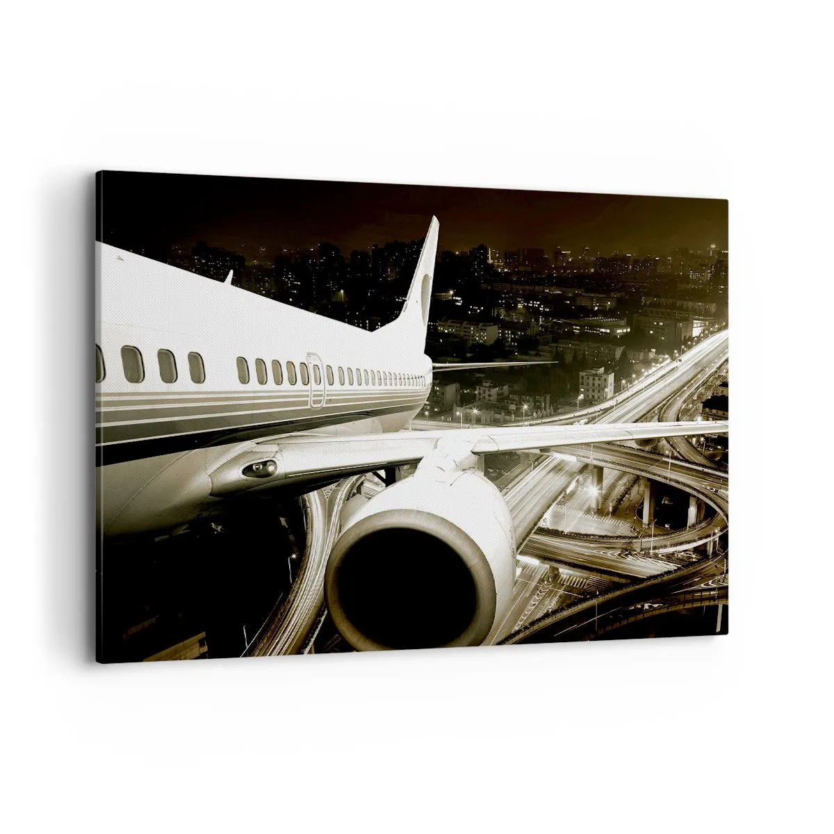 Cuadro sobre lienzo - Impresión de Imagen - Un avión sobre una ciudad nocturna con carreteras iluminadas. - 100x70cm - Vuela hacia la noche - Decoración de pared moderna para salón y dormitorio ARTTOR