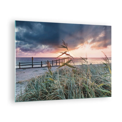 Cuadro sobre vidrio - Impresiones sobre Vidrio - La playa al atardecer con vistas al muelle, rodeada de césped. - 70x50cm - Bailando con el viento - Decoración de pared moderna para salón y dormitorio ARTTOR
