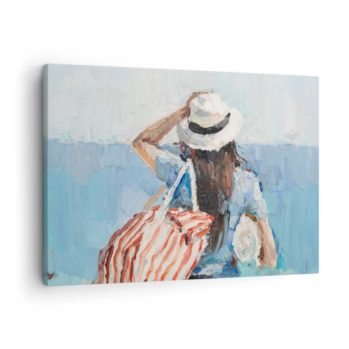 Cuadro sobre lienzo - Impresión de Imagen - Una mujer con sombrero frente al mar azul. - 70x50cm - Bienvenida a tus vacaciones - Decoración de pared moderna para salón y dormitorio ARTTOR