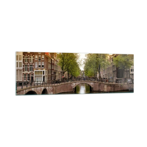 Cuadro sobre vidrio - Impresiones sobre Vidrio - Un canal en Ámsterdam rodeado de casas de vecindad históricas - 160x50cm - ¿En barco o en bicicleta? - Decoración de pared moderna para salón y dormitorio ARTTOR