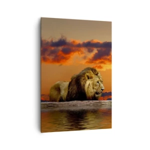 Cuadro sobre lienzo - Impresión de Imagen - Un león descansa junto al agua al atardecer con un cielo dramático. - 70x100cm - Rey de la naturaleza - Decoración de pared moderna para salón y dormitorio ARTTOR