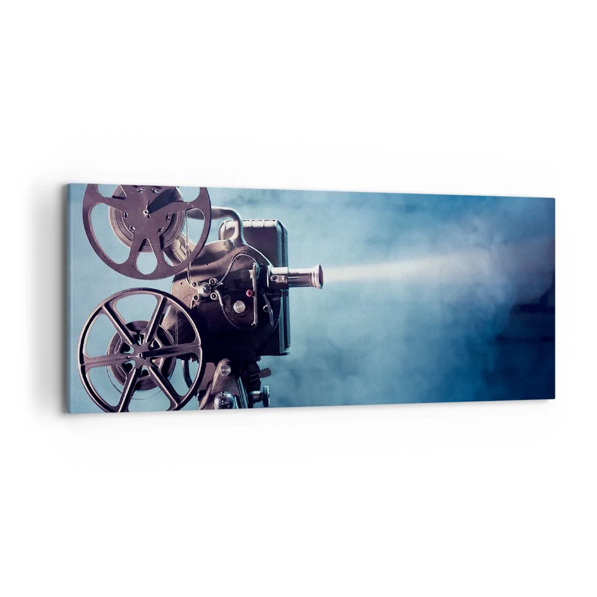 Cuadro sobre lienzo - Impresión de Imagen - Un antiguo proyector de películas que proyecta luz sobre un fondo azul. - 120x50cm - En el antiguo cine - Decoración de pared moderna para salón y dormitorio ARTTOR