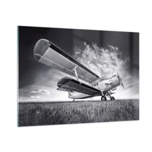 Cuadro sobre vidrio - Impresiones sobre Vidrio - Una fotografía en blanco y negro de un avión contra un cielo espectacular. - 100x70cm - El vagamundo alado - Decoración de pared moderna para salón y dormitorio ARTTOR