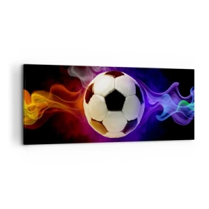 Cuadro sobre lienzo - Impresión de Imagen - Un balón de fútbol rodeado de efectos de humo de colores sobre un fondo oscuro. - 120x50cm - El poder mágico del juego - Decoración de pared moderna para salón y dormitorio ARTTOR
