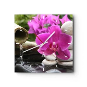 Reloj de pared - Reloj de vidrio - Orquídea morada, piedras y bambú con agua en un entorno relajante. - 30x30cm - Ya estás descansando - Decoración de pared moderna para salón y dormitorio ARTTOR