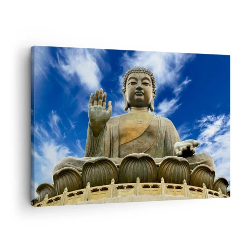 Cuadro sobre lienzo - Impresión de Imagen - Una estatua monumental de Buda contra un cielo azul con nubes. - 70x50cm - Vivir sin miedo - Decoración de pared moderna para salón y dormitorio ARTTOR